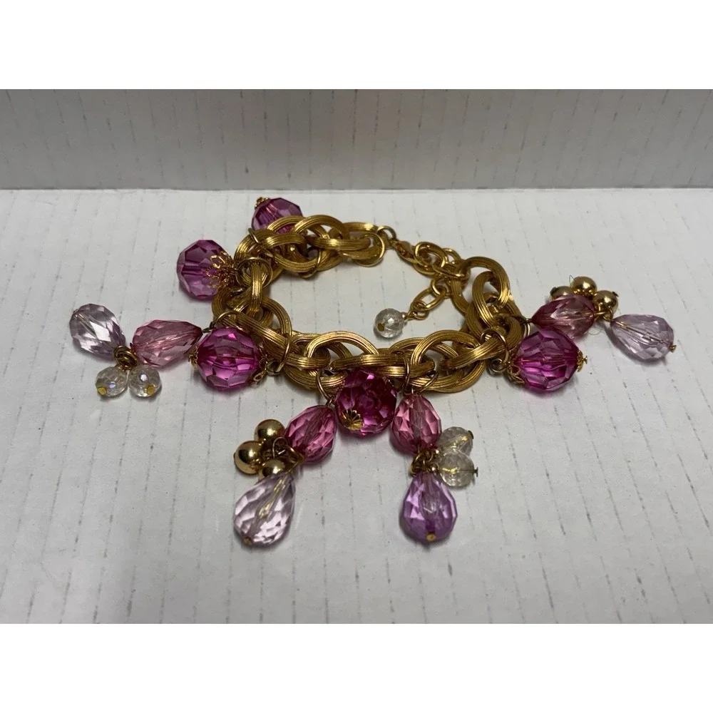 Bracelet‎ Gold Tone Dangling Pink Lilac Plastic Beads Charms Festive look